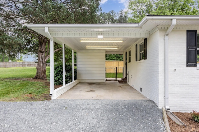 view of vehicle parking with a carport