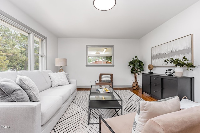 2205 W Carver St, Durham, NC 27705 - living area featuring wood finished floors and baseboards