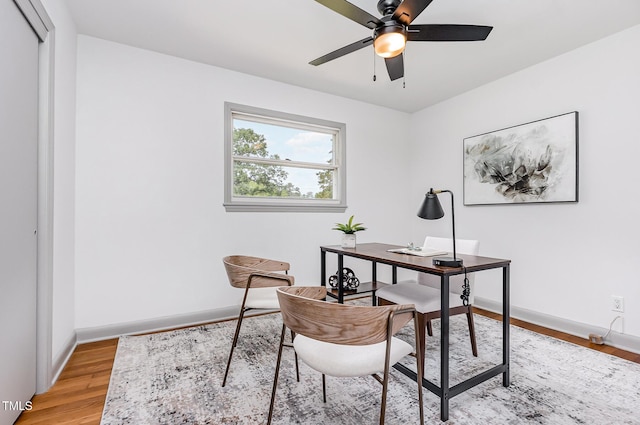 2205 W Carver St, Durham, NC 27705 - office with light wood finished floors, baseboards, and a ceiling fan