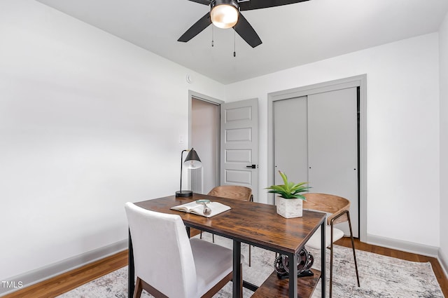 2205 W Carver St, Durham, NC 27705 - dining room featuring ceiling fan, baseboards, wood finished floors, and a desk