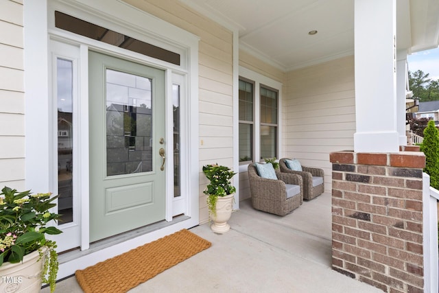 entrance to property with a porch