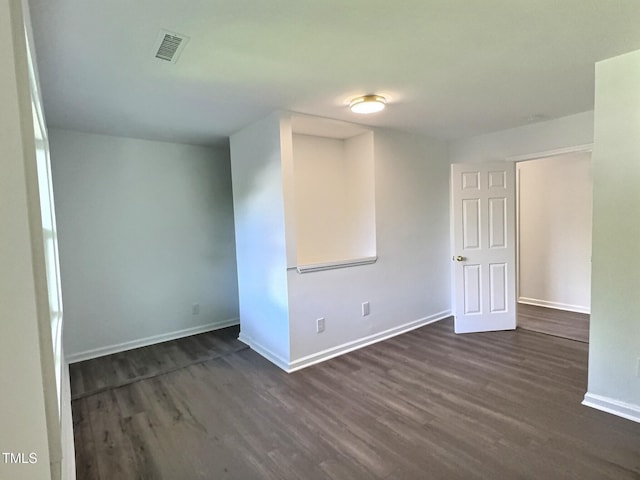 114 N Guthrie Ave, Durham, NC 27703 - spare room featuring dark wood finished floors and baseboards