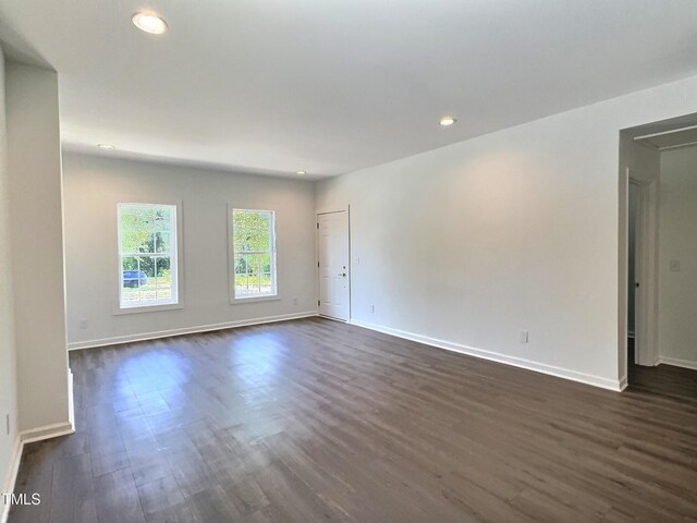 114 N Guthrie Ave, Durham, NC 27703 - empty room featuring dark wood finished floors, baseboards, and recessed lighting