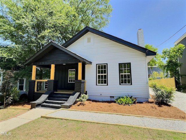 114 N Guthrie Ave, Durham, NC 27703 - view of front of property featuring crawl space, covered porch, and a chimney