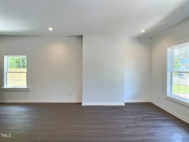 114 N Guthrie Ave, Durham, NC 27703 - empty room featuring dark wood-style flooring, recessed lighting, and baseboards
