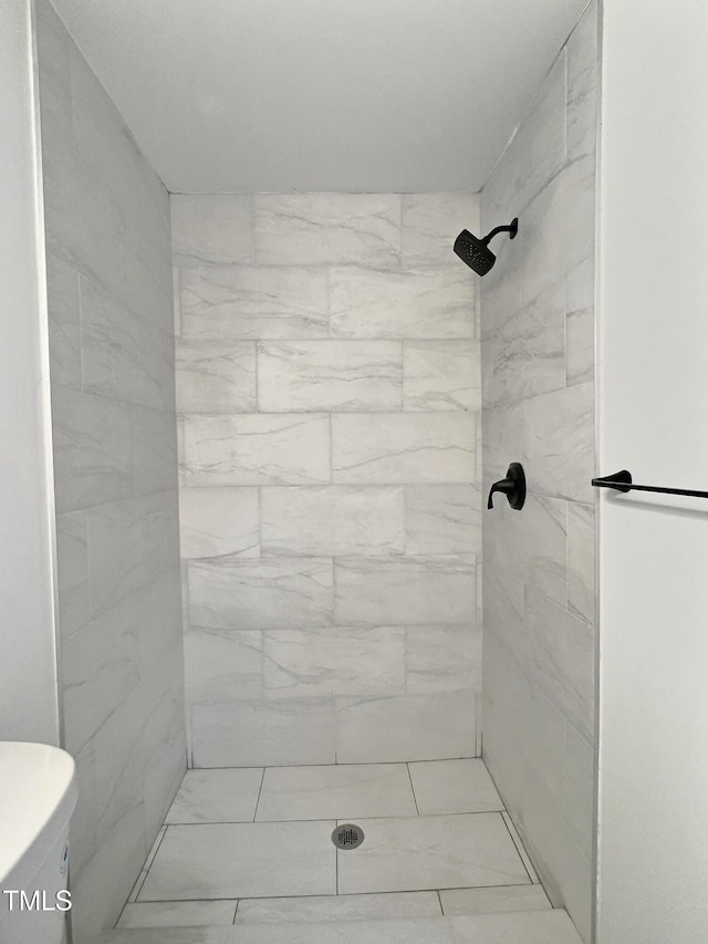 114 N Guthrie Ave, Durham, NC 27703 - bathroom featuring a tile shower and toilet