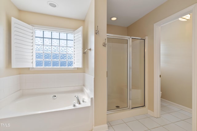 115 Spring Branch Dr, Four Oaks, NC 27524 - bathroom with a bath, a shower stall, tile patterned flooring, and toilet
