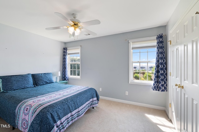 115 Spring Branch Dr, Four Oaks, NC 27524 - bedroom with baseboards, carpet flooring, a ceiling fan, and a closet