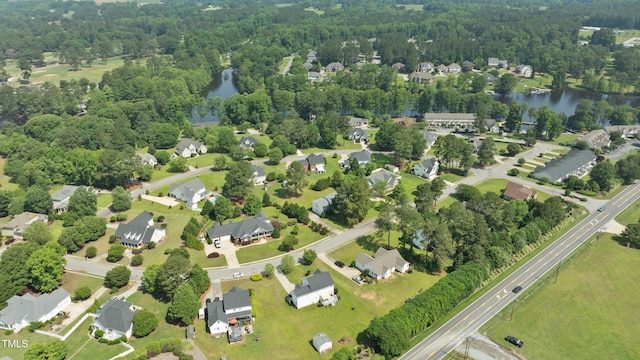 115 Spring Branch Dr, Four Oaks, NC 27524 - aerial overview of property's location featuring a large body of water and nearby suburban area