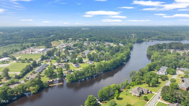 115 Spring Branch Dr, Four Oaks, NC 27524 - aerial overview of property's location featuring a large body of water and a forest