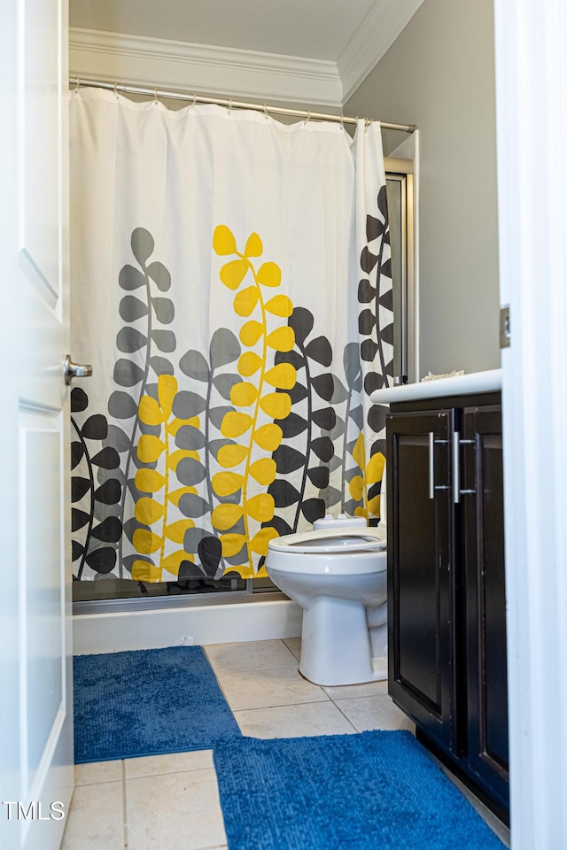 bathroom with ornamental molding, a shower with shower curtain, tile patterned flooring, and toilet