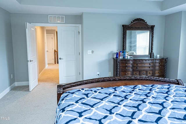 bedroom with carpet and baseboards
