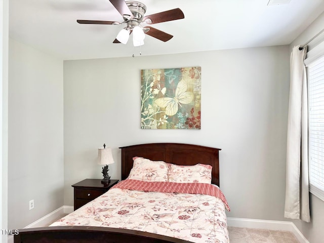 5016 Trembath Ln, Cary, NC 27519 - bedroom featuring baseboards and ceiling fan