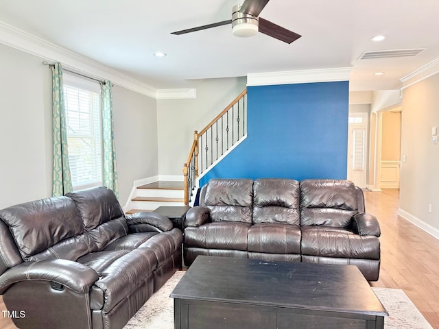 5016 Trembath Ln, Cary, NC 27519 - living area with crown molding, stairway, wood finished floors, a ceiling fan, and recessed lighting