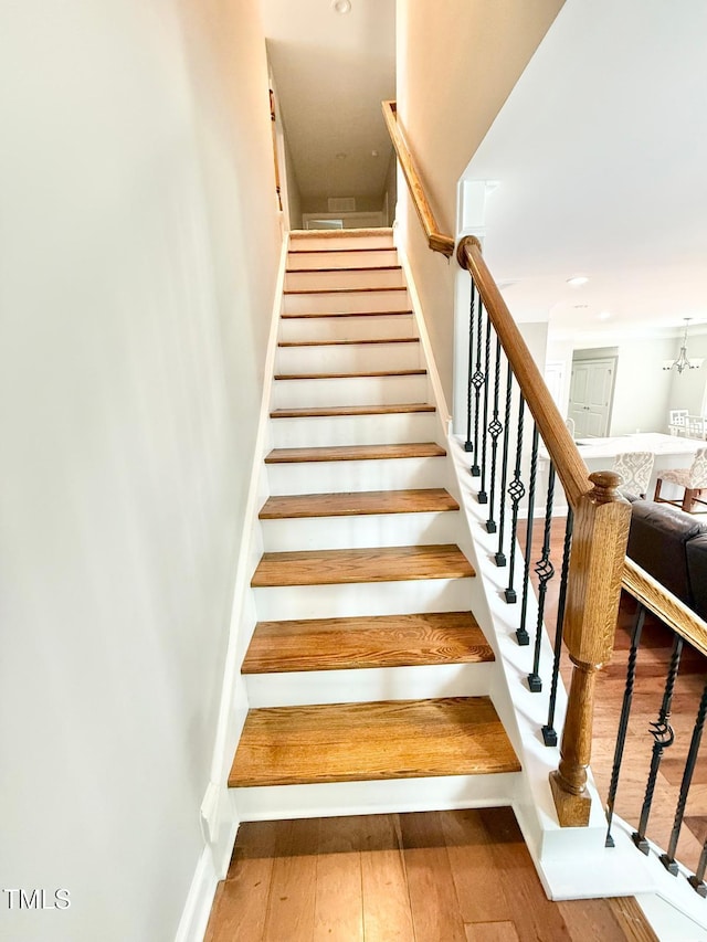 5016 Trembath Ln, Cary, NC 27519 - stairway featuring hardwood / wood-style floors and recessed lighting