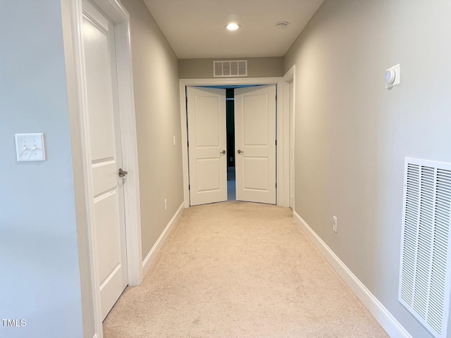 5016 Trembath Ln, Cary, NC 27519 - hallway with light colored carpet, baseboards, and recessed lighting