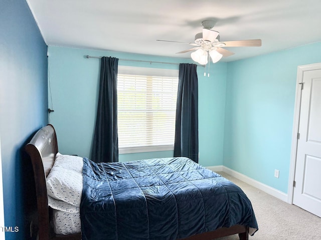 5016 Trembath Ln, Cary, NC 27519 - bedroom featuring carpet floors, baseboards, and ceiling fan