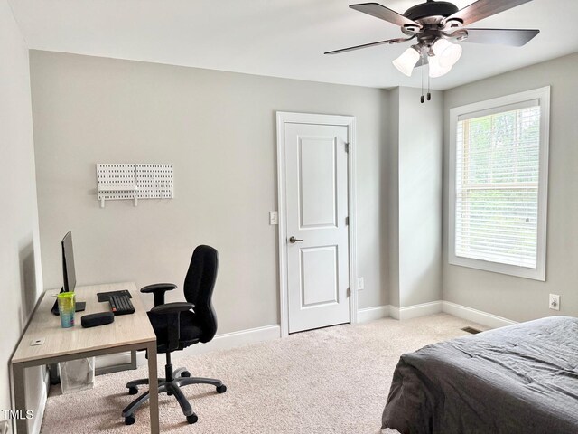 5016 Trembath Ln, Cary, NC 27519 - bedroom with carpet, baseboards, an office area, and ceiling fan
