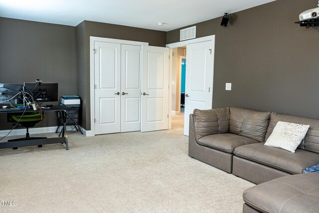 5016 Trembath Ln, Cary, NC 27519 - living area with carpet flooring, an office area, and baseboards