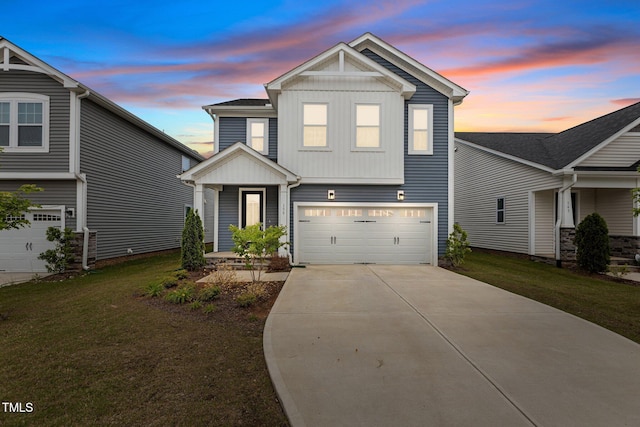 159 Wood Orchid Ln, Garner, NC 27529 - traditional-style home with board and batten siding, concrete driveway, an attached garage, and a yard