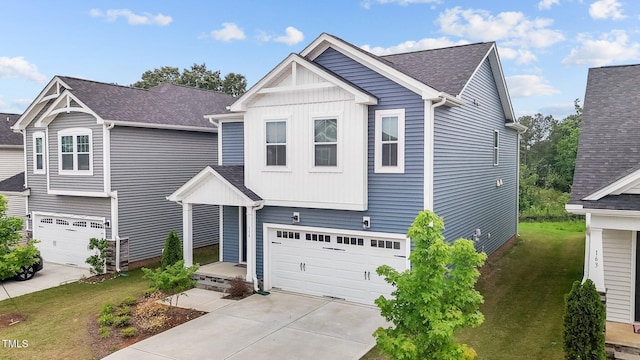 159 Wood Orchid Ln, Garner, NC 27529 - view of front of home featuring a garage, concrete driveway, a front lawn, and a shingled roof