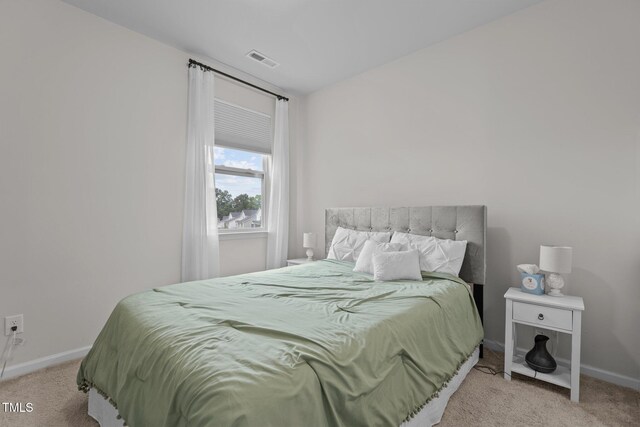 159 Wood Orchid Ln, Garner, NC 27529 - bedroom featuring light carpet and baseboards