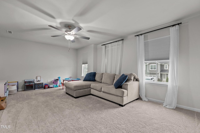 159 Wood Orchid Ln, Garner, NC 27529 - carpeted living area with a ceiling fan and baseboards