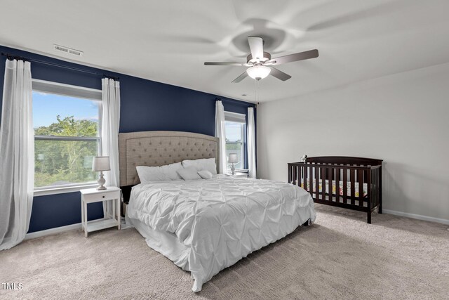159 Wood Orchid Ln, Garner, NC 27529 - carpeted bedroom with baseboards and a ceiling fan