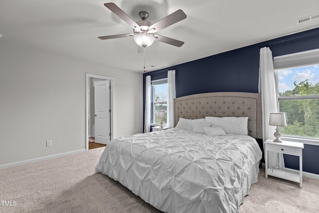 159 Wood Orchid Ln, Garner, NC 27529 - bedroom with carpet floors, baseboards, and a ceiling fan