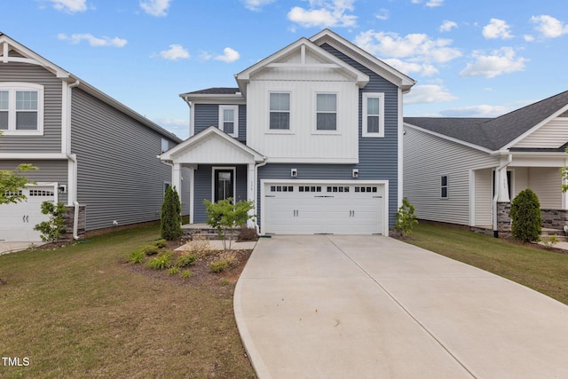 159 Wood Orchid Ln, Garner, NC 27529 - view of front of property featuring a garage, board and batten siding, a front yard, and concrete driveway