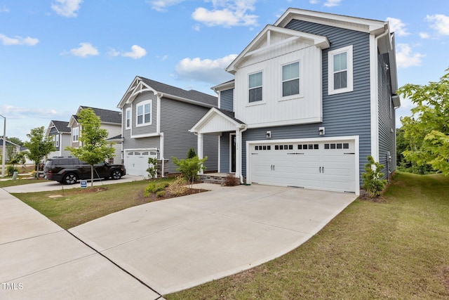 159 Wood Orchid Ln, Garner, NC 27529 - view of front of property with a garage, a front lawn, concrete driveway, and board and batten siding
