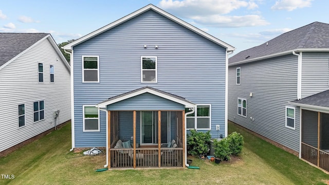 159 Wood Orchid Ln, Garner, NC 27529 - back of house featuring a sunroom and a yard