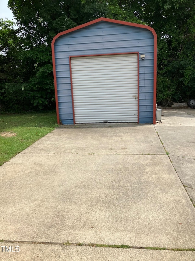 836 S Main St, Roxboro, NC 27573 - detached garage featuring concrete driveway