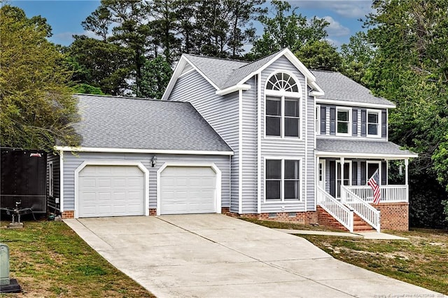 750 Magellan Ct, Fayetteville, NC 28311 - traditional-style house featuring an attached garage, concrete driveway, roof with shingles, crawl space, and a porch