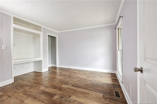 750 Magellan Ct, Fayetteville, NC 28311 - unfurnished bedroom featuring wood finished floors and crown molding