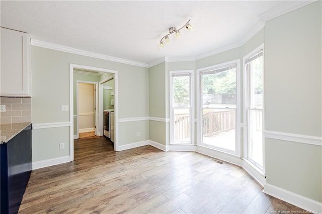 750 Magellan Ct, Fayetteville, NC 28311 - unfurnished dining area featuring light wood-style flooring and ornamental molding