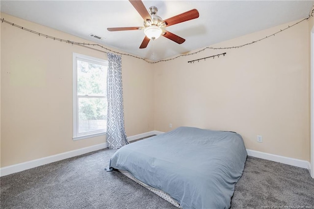 750 Magellan Ct, Fayetteville, NC 28311 - bedroom featuring carpet and a ceiling fan