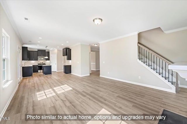 1406 Reading Ct Unit 93Kl, Burlington, NC 27217 - unfurnished living room featuring stairs, crown molding, light wood finished floors, baseboards, and recessed lighting