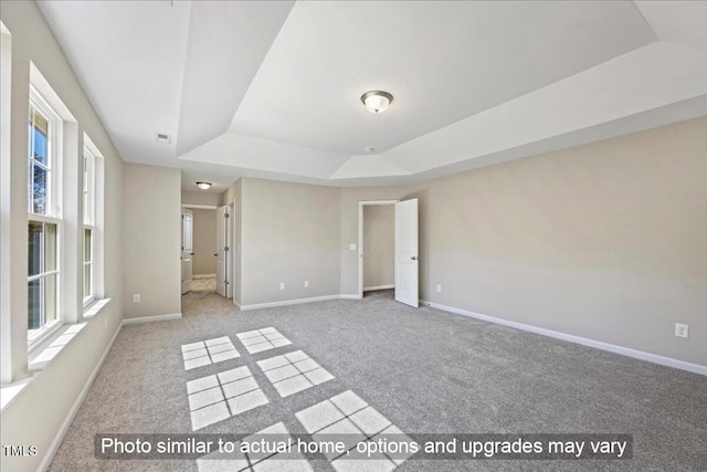 1406 Reading Ct Unit 93Kl, Burlington, NC 27217 - carpeted spare room with a raised ceiling and baseboards