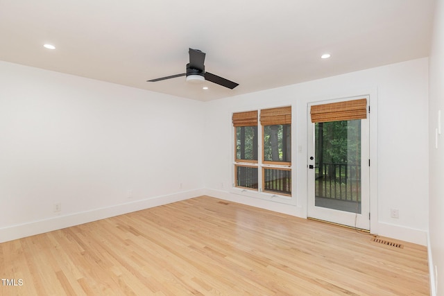 unfurnished room with light wood finished floors, baseboards, recessed lighting, and a ceiling fan