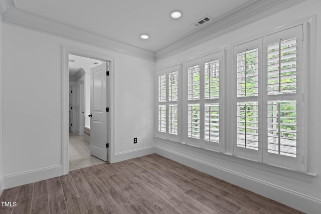 3323 Cheswick Dr, Raleigh, NC 27609 - unfurnished room featuring ornamental molding, baseboards, recessed lighting, and wood finished floors