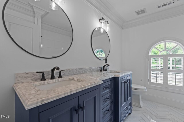 3323 Cheswick Dr, Raleigh, NC 27609 - full bathroom with toilet, crown molding, and double vanity