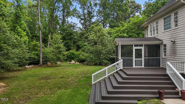 3323 Cheswick Dr, Raleigh, NC 27609 - view of green lawn with a sunroom, a wooden deck, and stairway