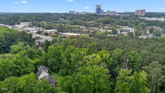3323 Cheswick Dr, Raleigh, NC 27609 - aerial view of a heavily wooded area