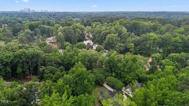 3323 Cheswick Dr, Raleigh, NC 27609 - aerial overview of property's location featuring a forest