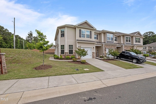 view of front facade featuring stone siding, driveway, an attached garage, and a front yard