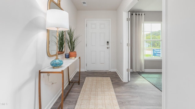 209 Wood St, La Grange, NC 28551 - foyer entrance featuring baseboards and wood finished floors