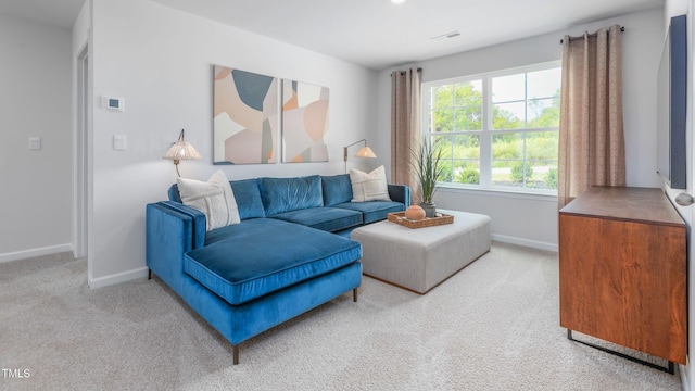 209 Wood St, La Grange, NC 28551 - living area with baseboards and carpet floors