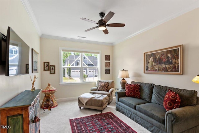 131 English Violet Ln, Raleigh, NC 27610 - carpeted living area with ceiling fan, ornamental molding, and baseboards