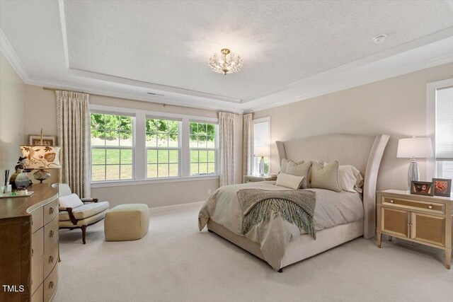 131 English Violet Ln, Raleigh, NC 27610 - bedroom with light colored carpet, a raised ceiling, ornamental molding, a chandelier, and baseboards